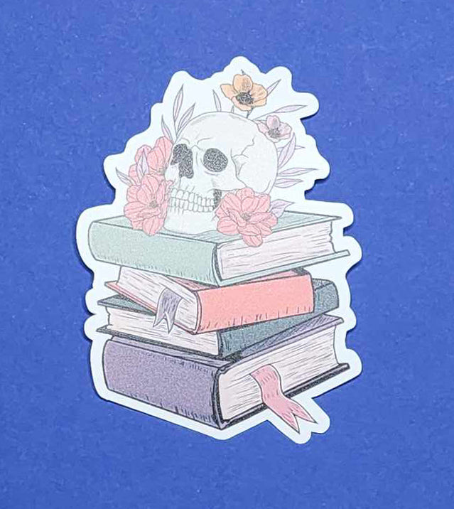 Floral skull on stacked books