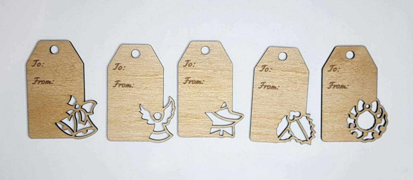 Handmade wooden Christmas gift tags with engraved holiday designs, rustic style.